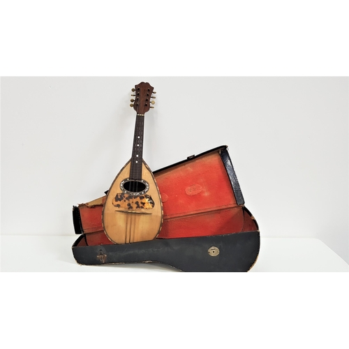 378 - ITALIAN MANDOLIN
with a bowl back, in maple and rosewood with mother of pearl and tortoiseshell inla... 