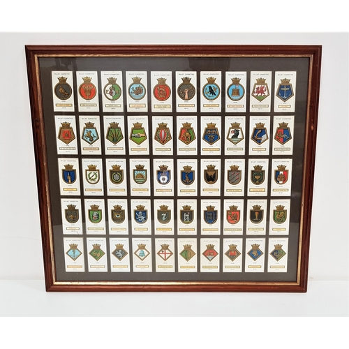 331 - FRAMED SET OF 'SHIP'S BADGES' WILLS'S CIGARETTE CARDS
50 cards in total, frame size 44.5cm x 49cm