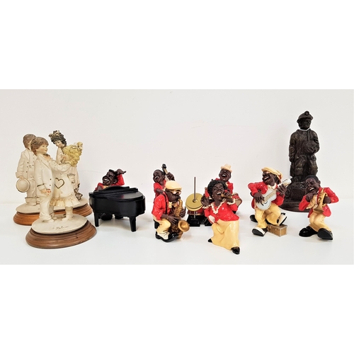 335 - SELECTION OF RESIN FIGURES
including an eight piece jazz band, two pairs of courting couples and one... 