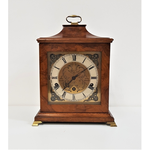 337 - WALNUT BRACKET CLOCK
with a brass dial and silvered chapter ring with Roman numerals and a Westminst... 