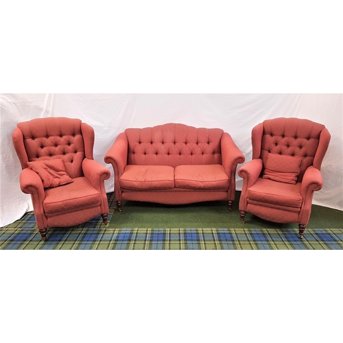 474 - THREE PIECE SUITE
comprising a shaped button back sofa with slanting scroll arms and two loose seat ... 