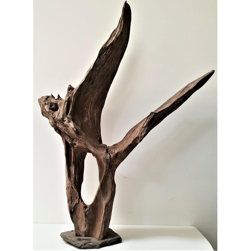 329 - ABSTRACT DRIFTWOOD SCULPTURE
mounted on a slate base, 80cm high