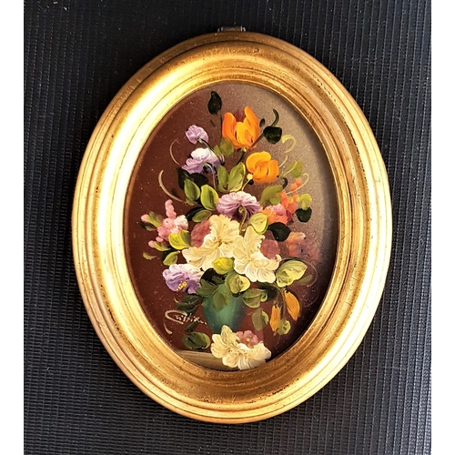 317 - FLORAL MINIATURE PAINTING
in oval gilt frame, signed Cristian, 11cm high