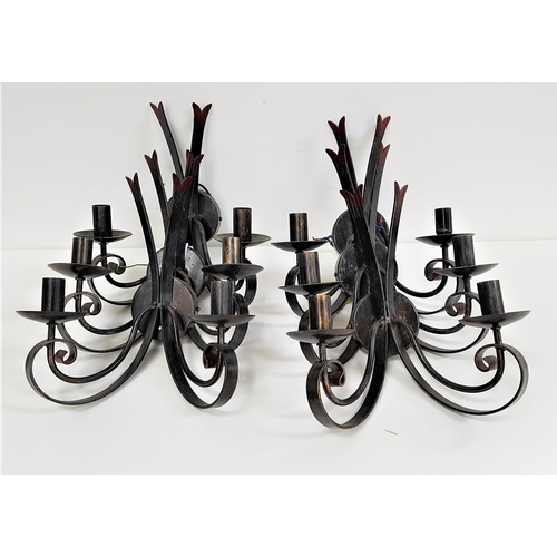 345 - SET OF SIX STEEL WALL LIGHTS
each with twin scroll arms on circular mounts, 36cm high (6)