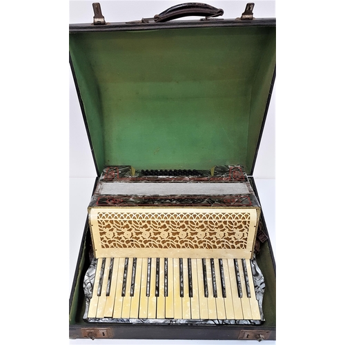 377 - CARSINI ACCORDIAN 
with leather shoulder straps, grey body, in a fitted case