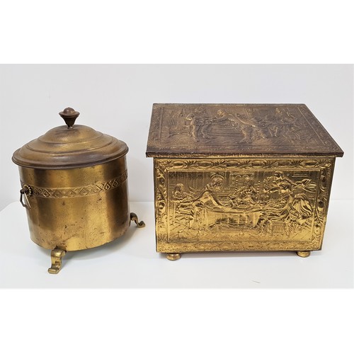 601 - BRASS EMBOSSED COAL BIN
with a sloping lid and lift out liner, decorated with Cromwellian scenes, 38... 