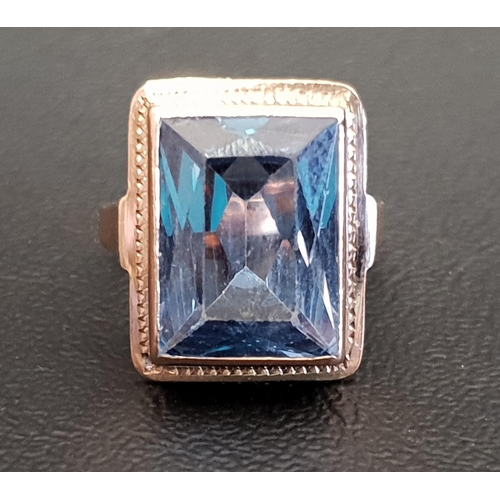 80 - BLUE TOPAZ SINGLE STONE RING 
the rectangular blue topaz measuring approximately 15mm x 11.5mm x 6.1... 