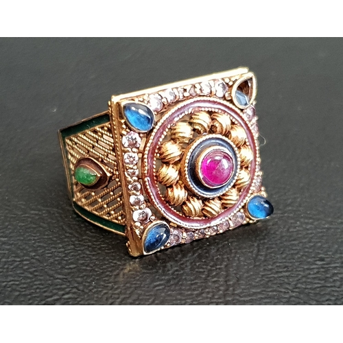 100 - GEM, ENAMEL AND PASTE SET DRESS RING
the central cabochon ruby in paste set decorative surround, wit... 