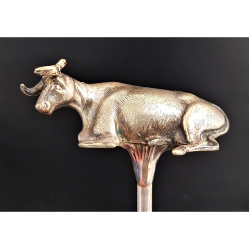 181 - SILVER PLATED MEAT SKEWER
with a recumbent cow finial