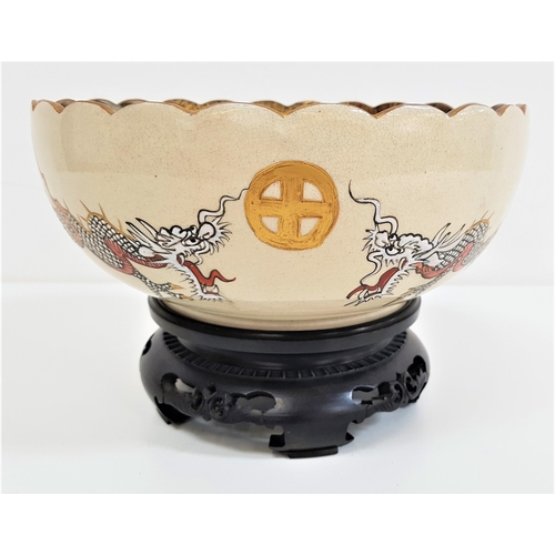 251 - JAPANESE SATSUMA BOWL
with a scalloped gilt edge rim, the bowl decorated with two dragons and many s... 