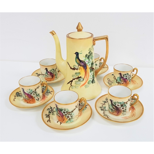 258 - CONTINENTAL PORCELAIN COFFEE SERVICE
decorated with a yellow ground and birds of paradise with gilt ... 