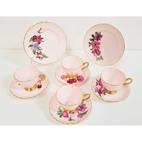 259 - TUSCAN CHINA TEA SET
decorated with a pink ground with gilt highlights with some saucers and side pl... 