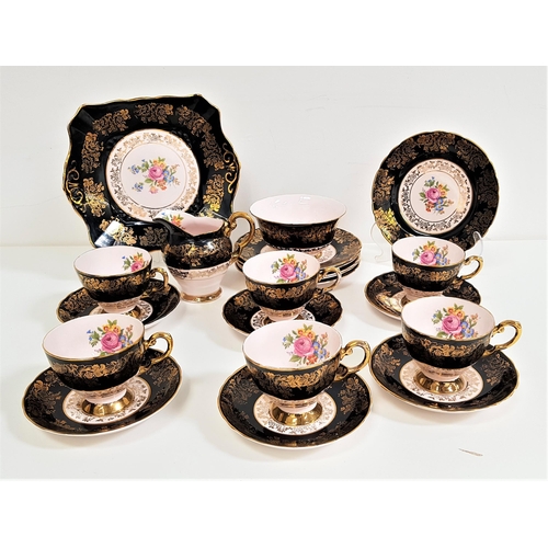 263 - PINK VOGUE FINE BONE CHINA TEA SET
with floral decoration and 22 carat gold detail, comprising six c... 