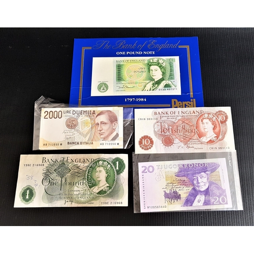 410 - SELECTION OF BANK NOTES
including a Bank Of England 10 Shillings, £1 and a Presentation £1, a Swedis... 