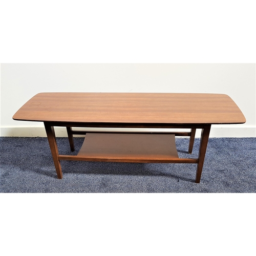 603 - RETRO MELAMINE TOPPED COFFEE TABLE
with a rectangular top, standing on tapering supports with a maga... 