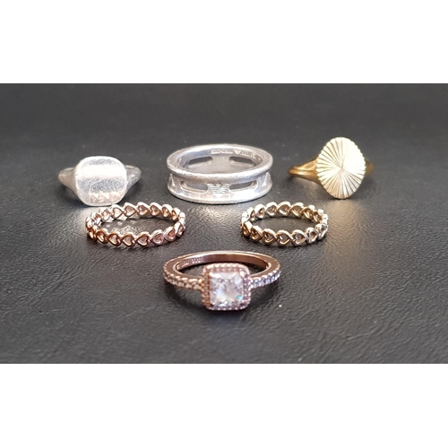 68 - SIX FASHION RINGS
comprising a silver Emporio Armani pierced band; a Thomas Sabo silver signet ring;... 