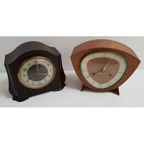 341 - SMITHS WALNUT CASED SHAPED MANTLE CLOCK
the irregular shaped dial with baton markers and an eight da... 