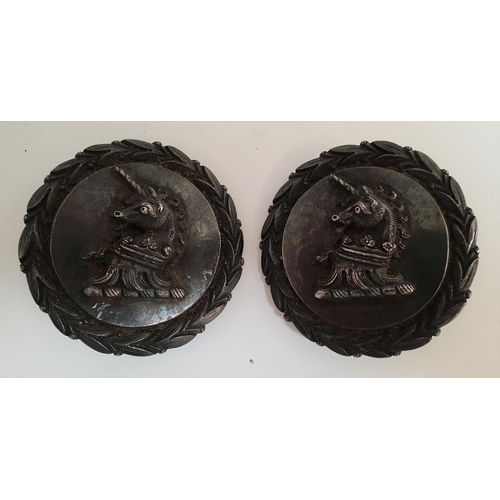 358 - PAIR OF EARLY 20th CENTURY STEEL ROUNDELS
depicting an heraldic unicorns head above a crown, with an... 