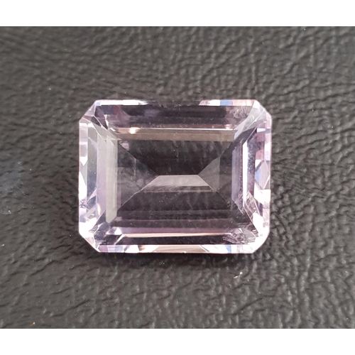 81 - CERTIFIED LOOSE ROSE QUARTZ GEMSTONE
the emerald step cut quartz weighing 12.41cts, with IDT Gemmolo... 