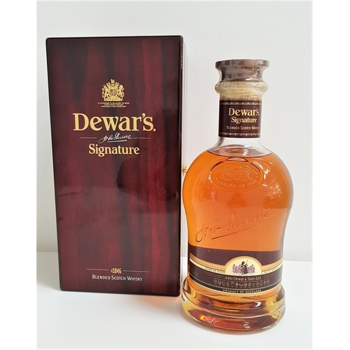 13 - DEWAR'S SIGANTURE BELNDED SCOTCH WHISKY
bottle number AA41839. 75cl and 43% abv. In presentation cas... 
