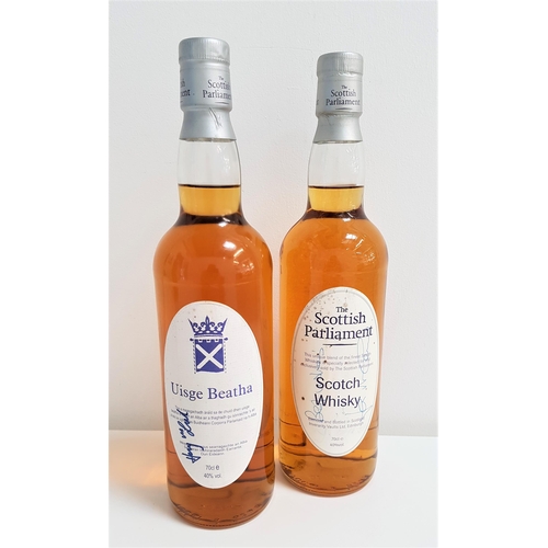 17 - TWO BOTTLES OF SIGNED BLENDED SCOTCH WHISKY
comprising one bottle of The Scottish Parliament Scotch ... 