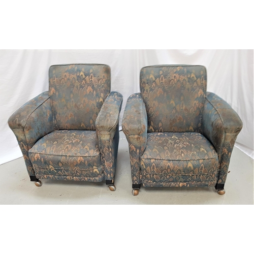 542 - PAIR OF 1930s ARMCHAIRS
with wide armrests, covered in a blue ground fabric, standing on stout block... 