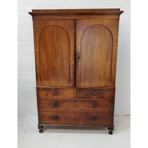 526 - VICTORIAN MAHOGANY PRESS CUPBOARD
with a cornice above a pair of arched panelled doors opening to re... 