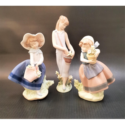 247 - THREE LLADRO FIGURINES
comprising Pretty Pickings - number 5222; Spring is Here - number 5223; and T... 