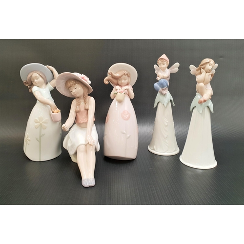 252 - THREE LLADRO FIGURINES AND TWO BELLS
the figures comprising a Lladro Utopia figure of a seated girl ... 