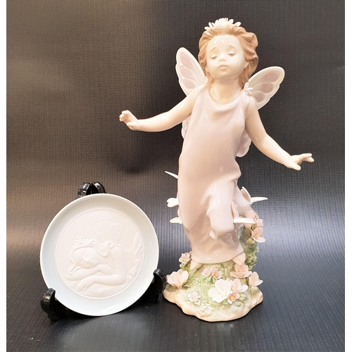 256 - LLADRO BUTTERFLY WINGS FIGURINE
number 6875, 23.5cm high; together a Lladro Privilege miniature plat... 