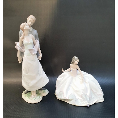 260 - TWO LLADRO FIGURINES
comprising Perfect Match - number 8251, 31.3cm high; and At the Ball - number 5... 