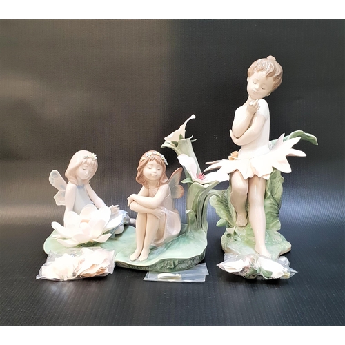 269 - THREE LLADRO FIGURINES
comprising Secrets of the Forest - number 6878, 26.5cm high; Lilypad Love Ang... 