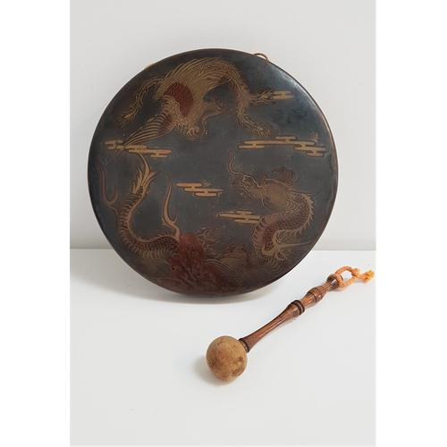 306 - DECORATIVE TABLE GONG
decorated with dragons, 30cm diameter, together with an oak turned mallet with... 