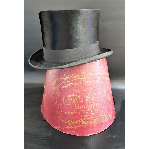 416 - GENTLEMANS BLACK SILK TOP HAT
marked to the interior Carl Kruck, Stuttgart, 19.7cm interior length, ... 