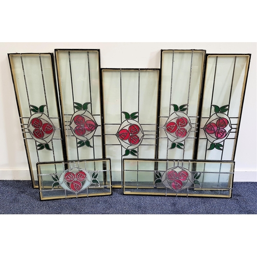 337 - SEVEN DOUBLE GLAZED WINDOW PANELS
each with a leaded stained glass design in the Glasgow style, of v... 