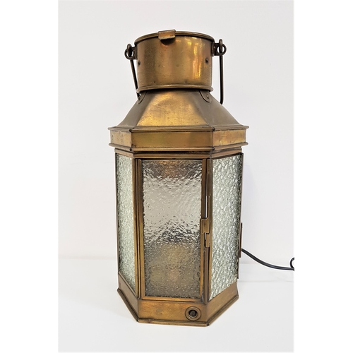 342 - BRASS LANTERN
now converted to electricity with a fold over carry handle above a circular hinged lid... 