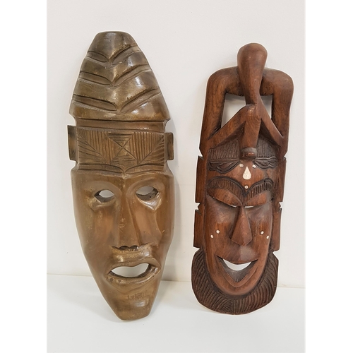 347 - CARVED AFRICAN WALL MASK
in teak with pierced detail and inset bone decoration, 44.5cm high, togethe... 