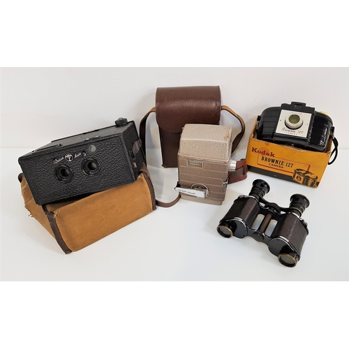 358 - KODAK BROWNIE 127 CAMERA
in original box, Bell & Howard 624 8mm cine camera and case, a Stereo Puck ... 