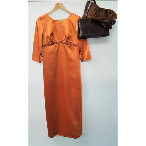 422 - 1950s SATIN EVENING GOWN
with pleated detail to the chest, in burnt orange satin, a Dido of Glasgow ... 