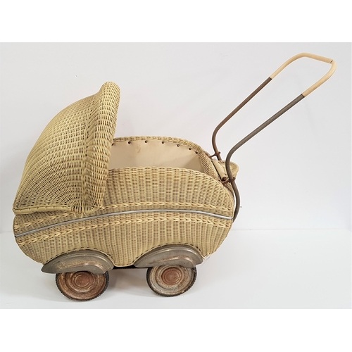427 - VINTAGE WICKER DOLLS PRAM
with a canopy, storage compartment on four wheels