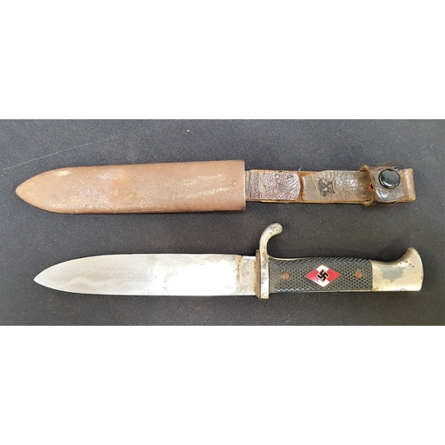 491 - WWII GERMAN HITLER YOUTH KNIFE
with a chequered grip inset with a swastika, the 14cm long blade mark...