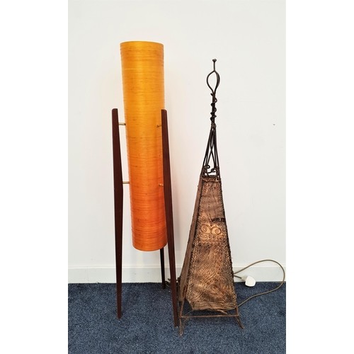 338 - VINTAGE NOVOPLAST ROCKET FLOOR LAMP
with a cylindrical orange fiberglass body on three shaped teak s... 