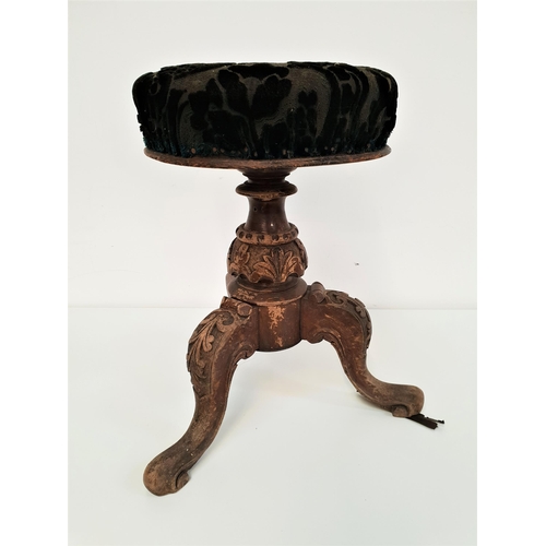 603 - VICTORIAN MAHOGANY PIANO STOOL
with a circular padded height adjustable seat, on a carved column and... 