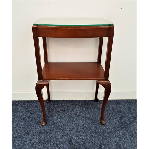 606 - MAHOGANY SIDE TABLE
the shaped moulded bow front top with a shelf below, standing on cabriole suppor... 