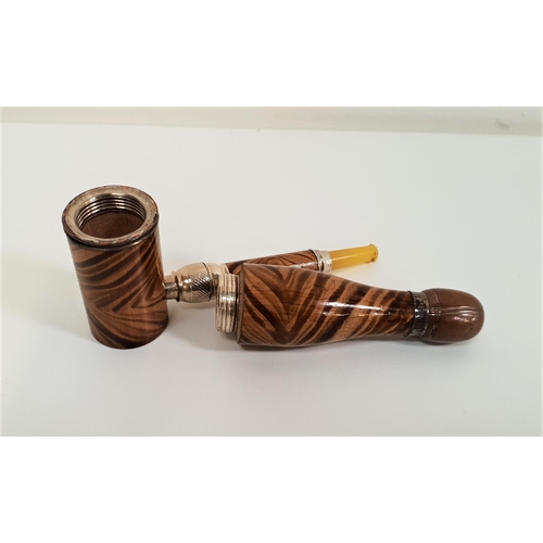 332 - NOVELTY WENGE PIPE
modelled as bottle with screw together body opening to reveal an inner slot in mo... 