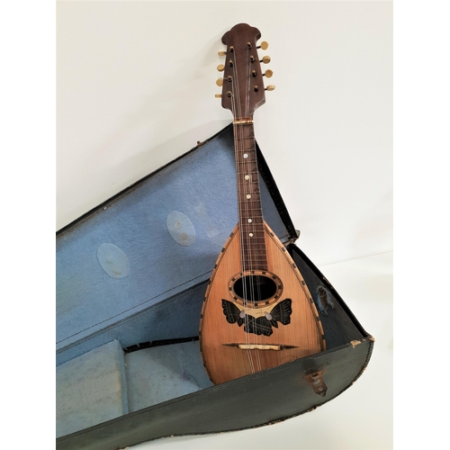 373 - ITALIAN MANDOLIN
with an internal label and stamped G. Puglisi Reale & Figli Catania, with a rosewoo... 