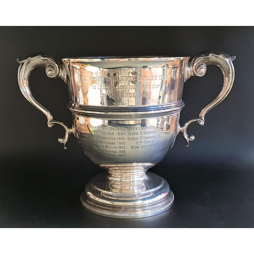 173 - VICTORIAN SILVER TWIN HANDLED CUP
with presentation inscription and a circular hardwood stand, Londo... 