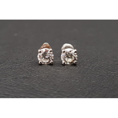 13 - PAIR OF DIAMOND STUD EARRINGS
the round brilliant cut diamonds totalling approximately 1.3cts (0.65c... 