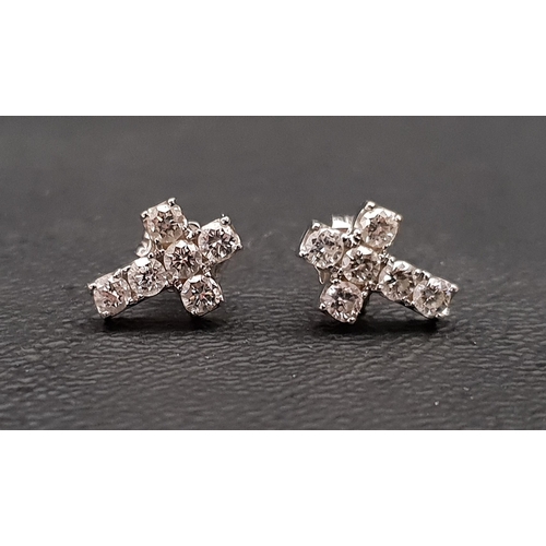 19 - PAIR OF DIAMOND CROSS SHAPED STUD EARRINGS
the diamonds totalling approximately 0.7cts (0.35cts per ... 