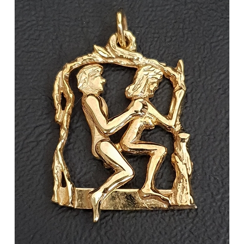 79 - UNUSUAL EROTIC NINE CARAT GOLD PENDANT
the male figure with articulated body seated behind the femal... 